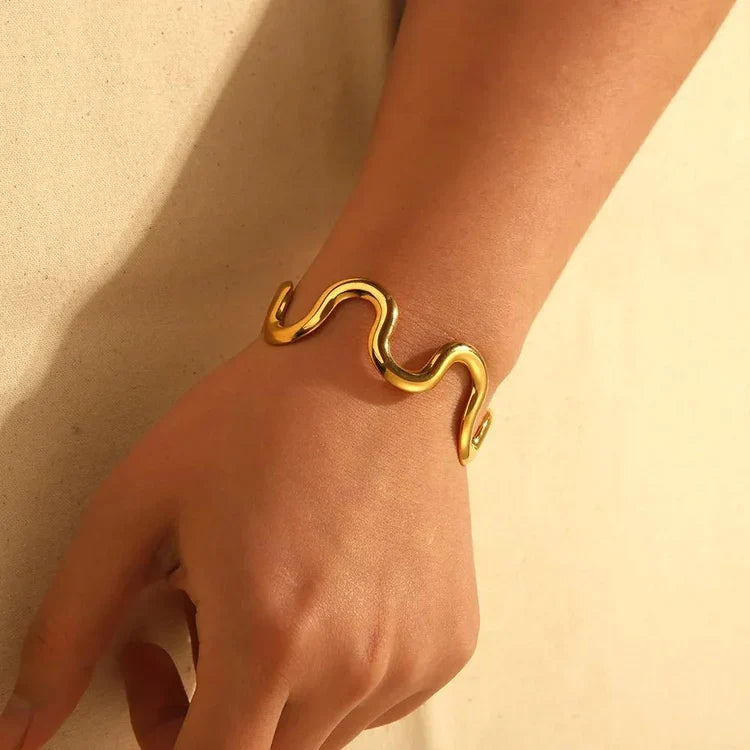 Golden wave shiny Bracelet by Aadiraa by Aarushi