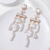 Regal Pearl Chandelier Earrings