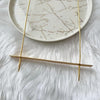 Modern long gold oscillate neckpiece