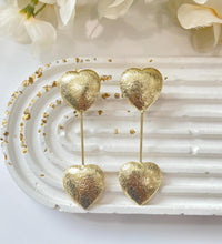 Golden heart drop earrings