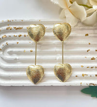 Golden heart drop earrings