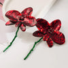 Red floral enamelled earrings
