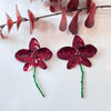 Red floral enamelled earrings