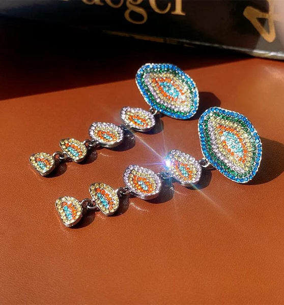 Beaded evil eye drop earrings