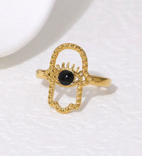 Statement black and gold evil eye ring