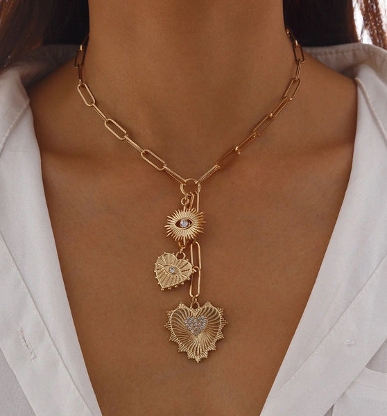 White stoned heart and evil eye necklace