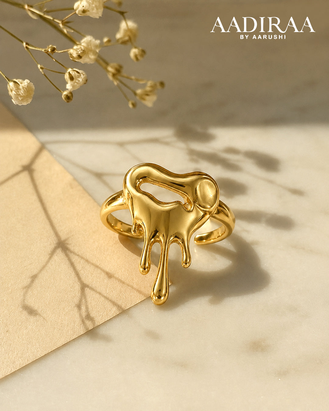 Melting heart gold statement ring