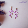 Boho Snake Shaped Polymer Clay Earrings in Lavender and White - aadiraabyaarushi